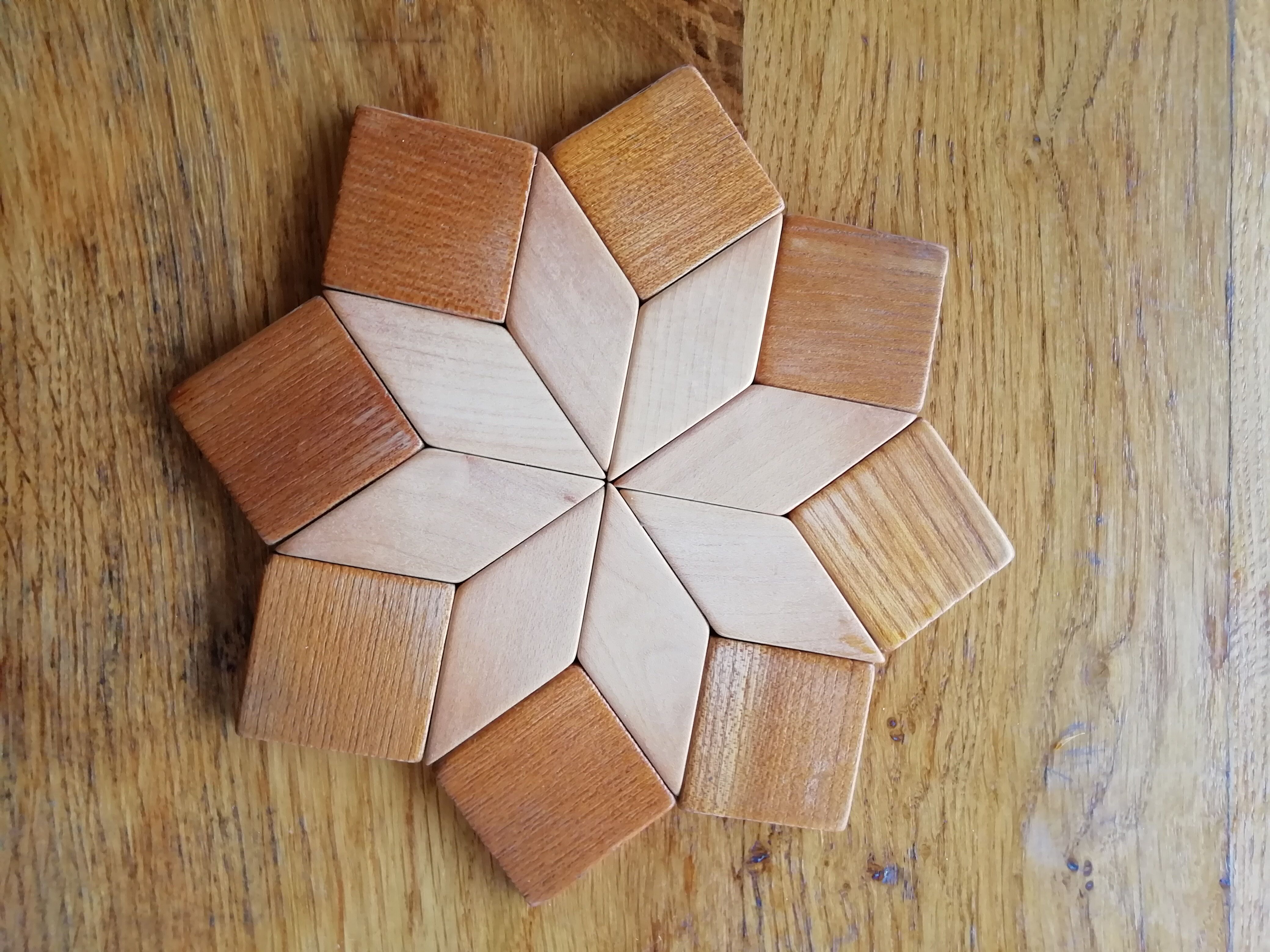 Under the geometric wooden plate