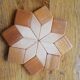 Under the geometric wooden plate