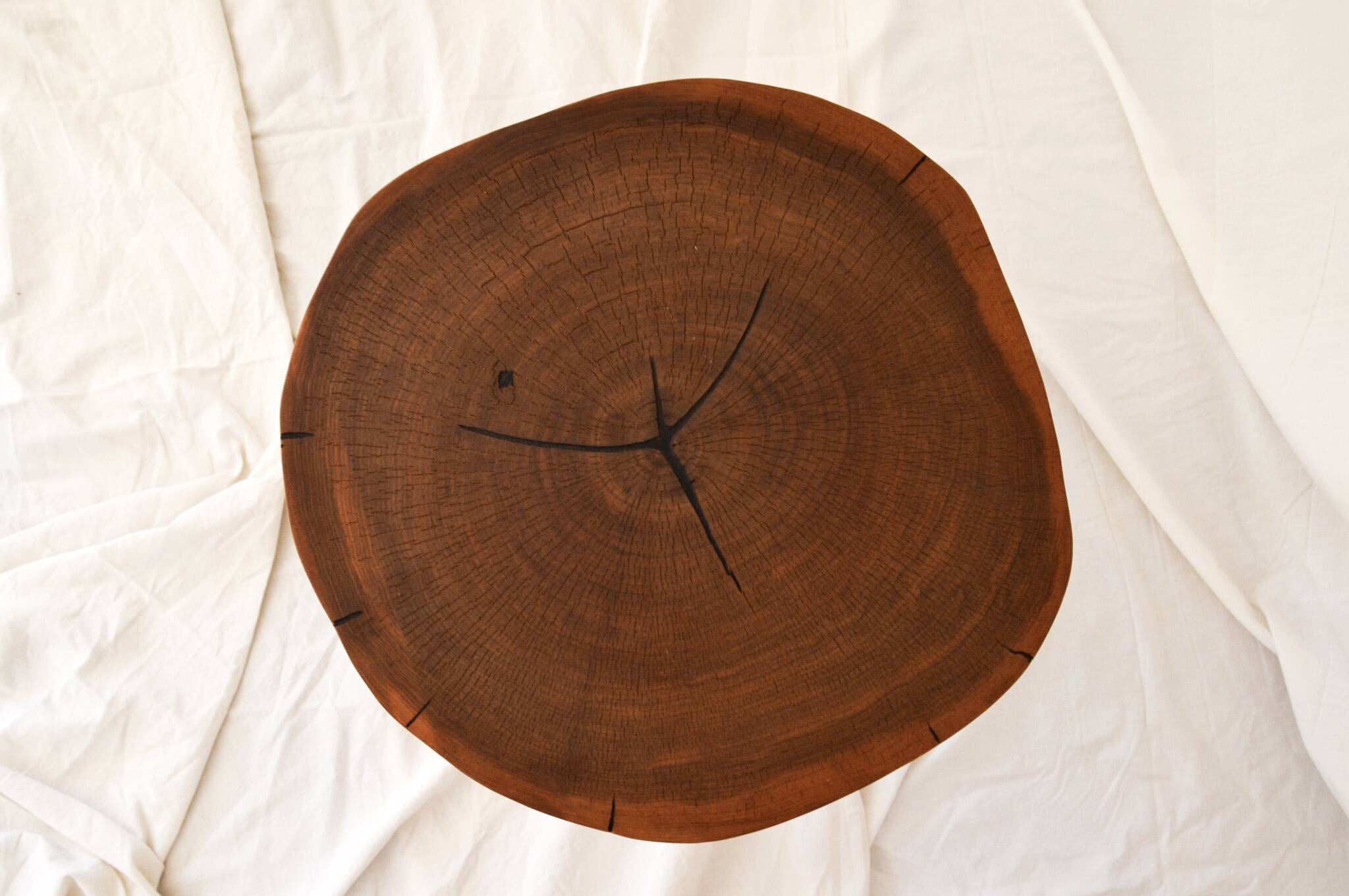 Round wooden coffee table walnut trunk