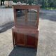 Victorian English two-body buffet with cherry wood on marble display case from the 19th century.
