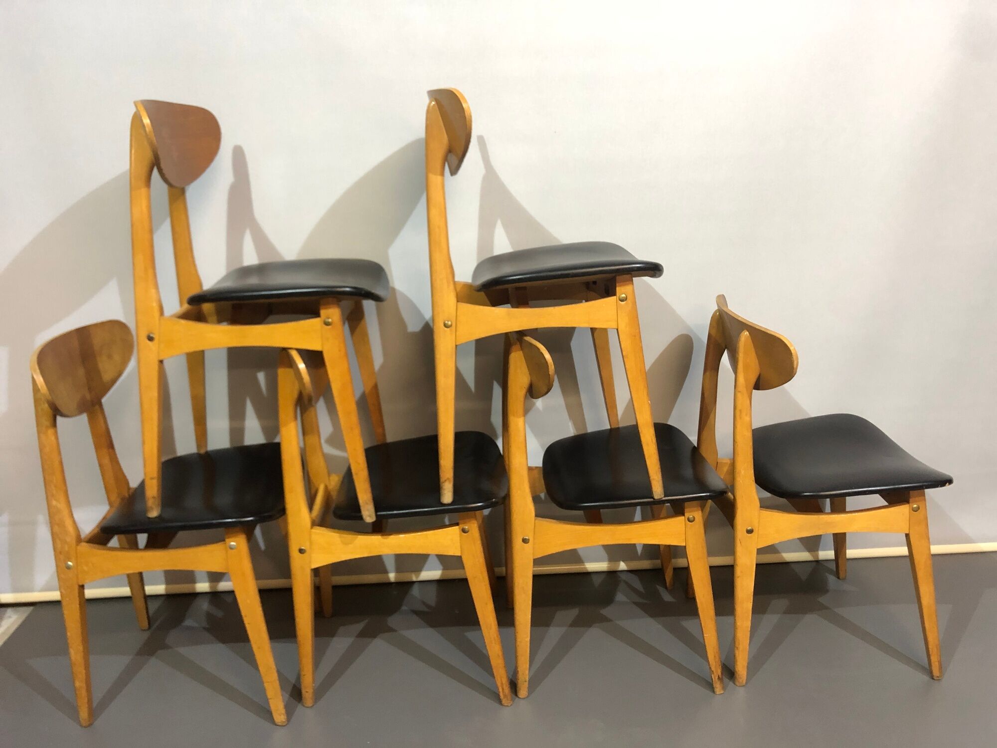 12 stella 1950 chairs in signed curved wood