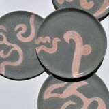 Set of 4 gray plates with rose patterns