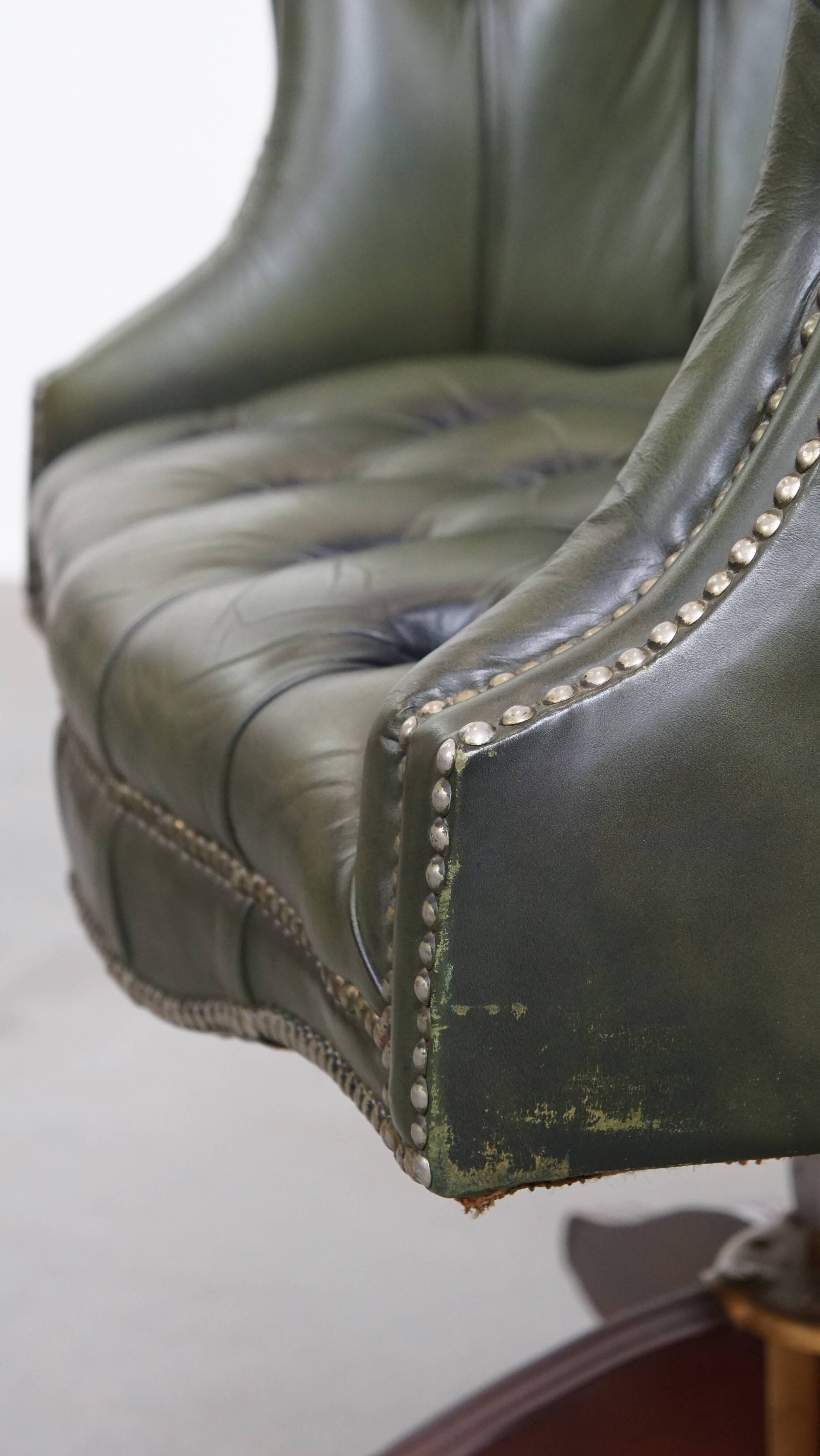 Chesterfield office chair in green cowhide leather on casters with high back