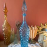 Large turquoise bottle