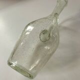 Bubble glass carafe bottle signed Biot in lime green colour.