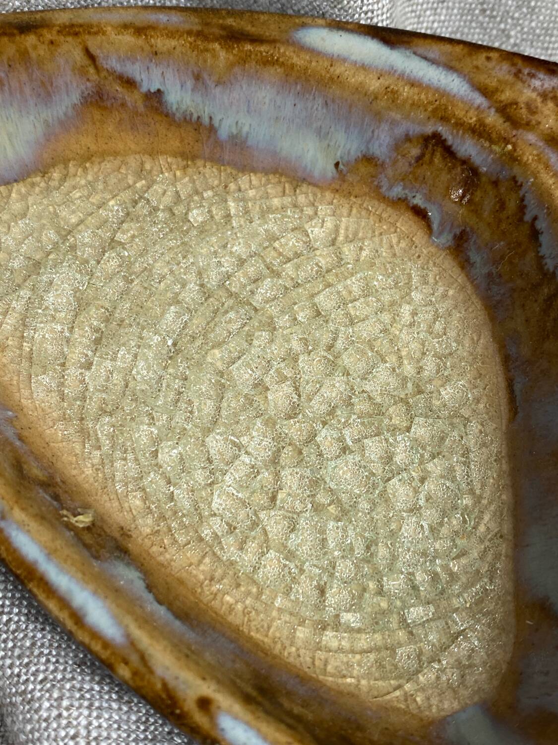 Glazed ceramic pocket emptier