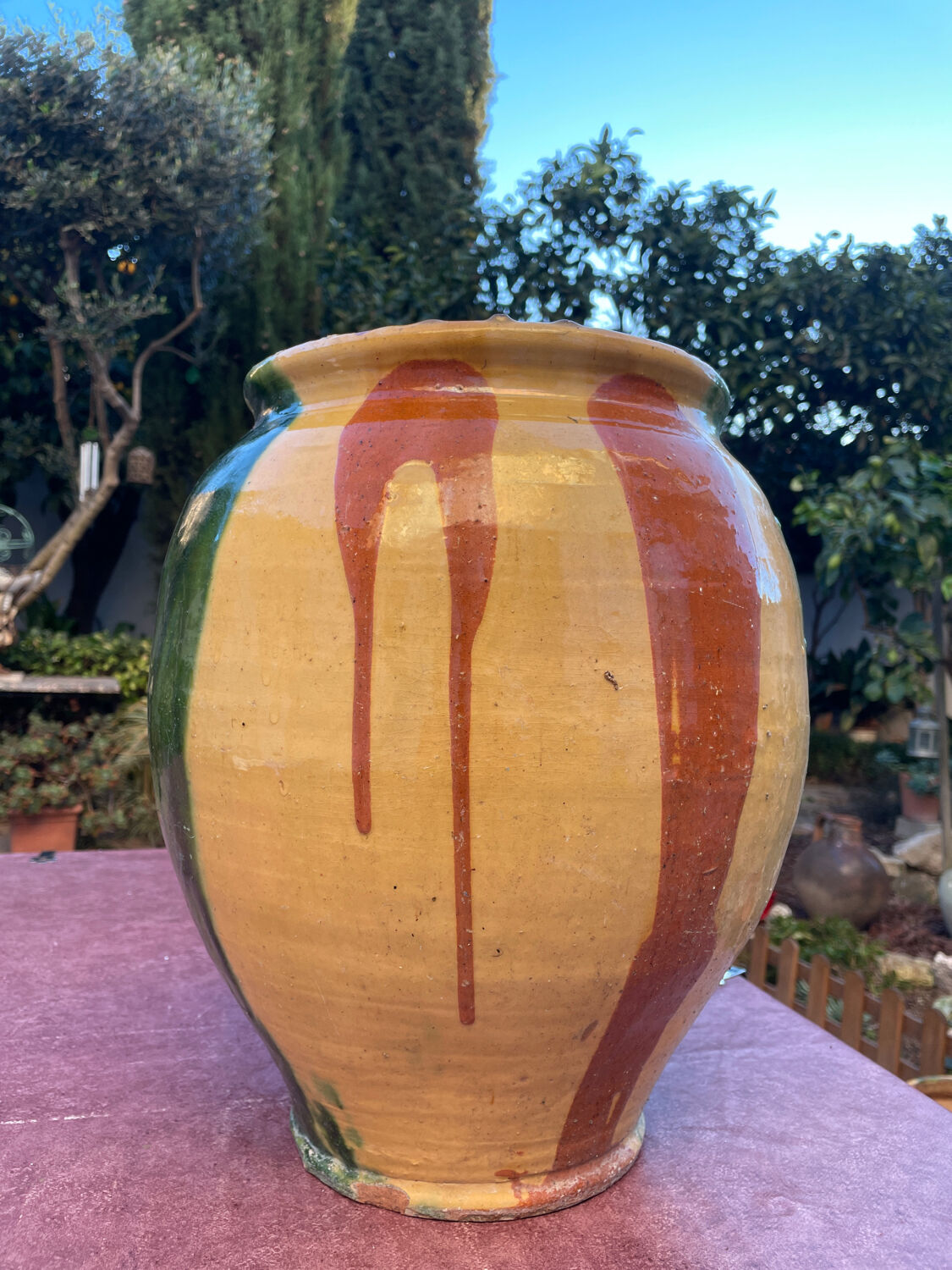 Old glazed terracotta jar