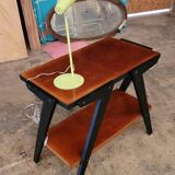 Vintage console design, sleek from the 1960s-70s.