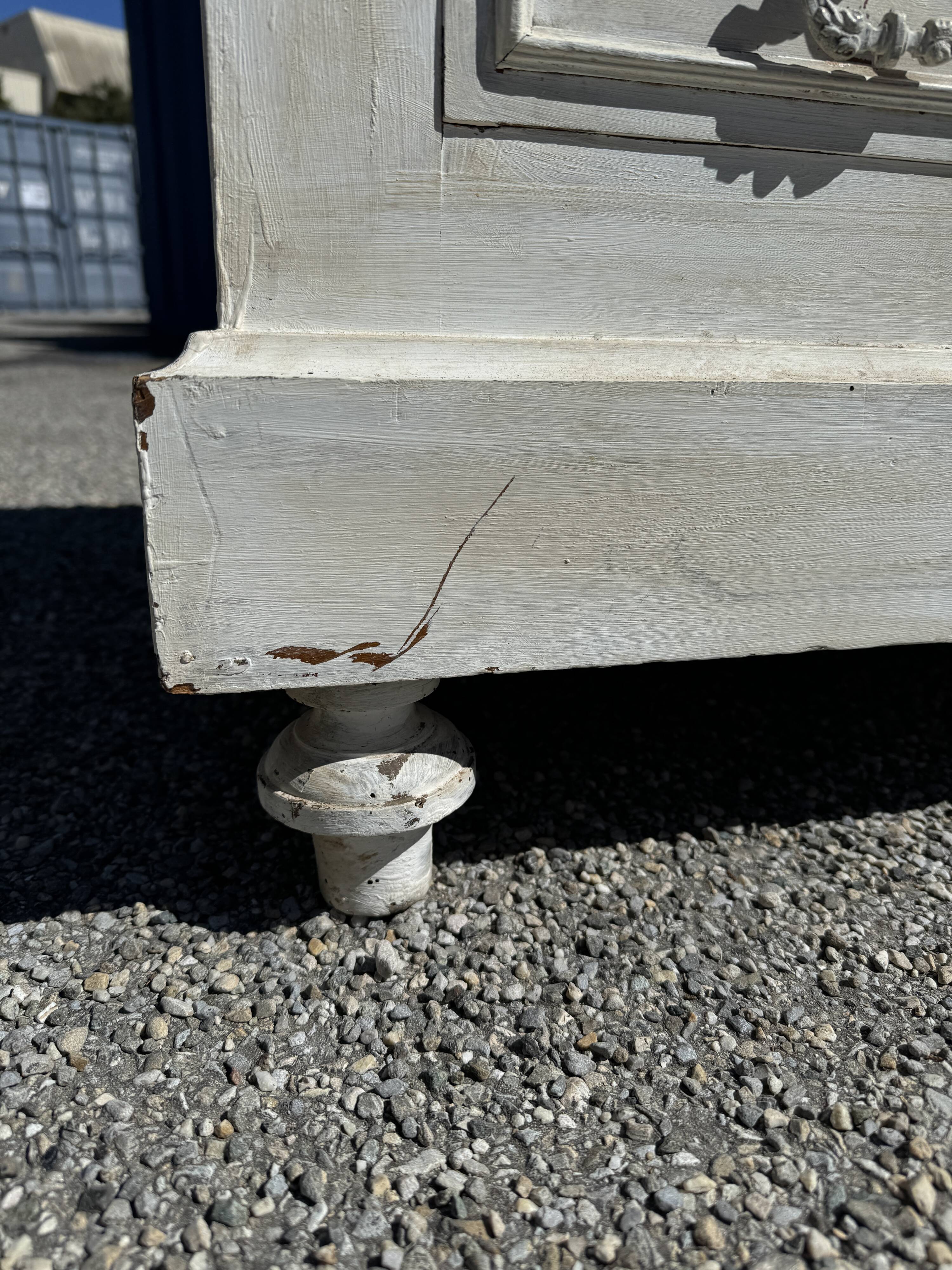 Old chest of drawers in bleached wood with white marble top