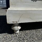 Old chest of drawers in bleached wood with white marble top