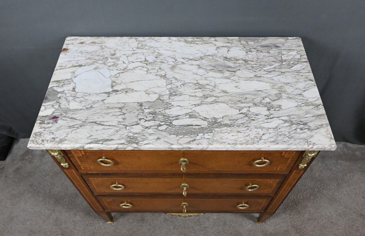 Small chest of drawers in amboyna and rosewood, Louis XVI style – 1940