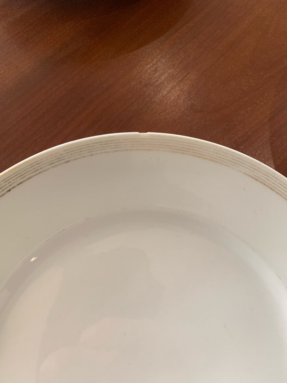 Lot of six flat plates, crockery, old white, gilded