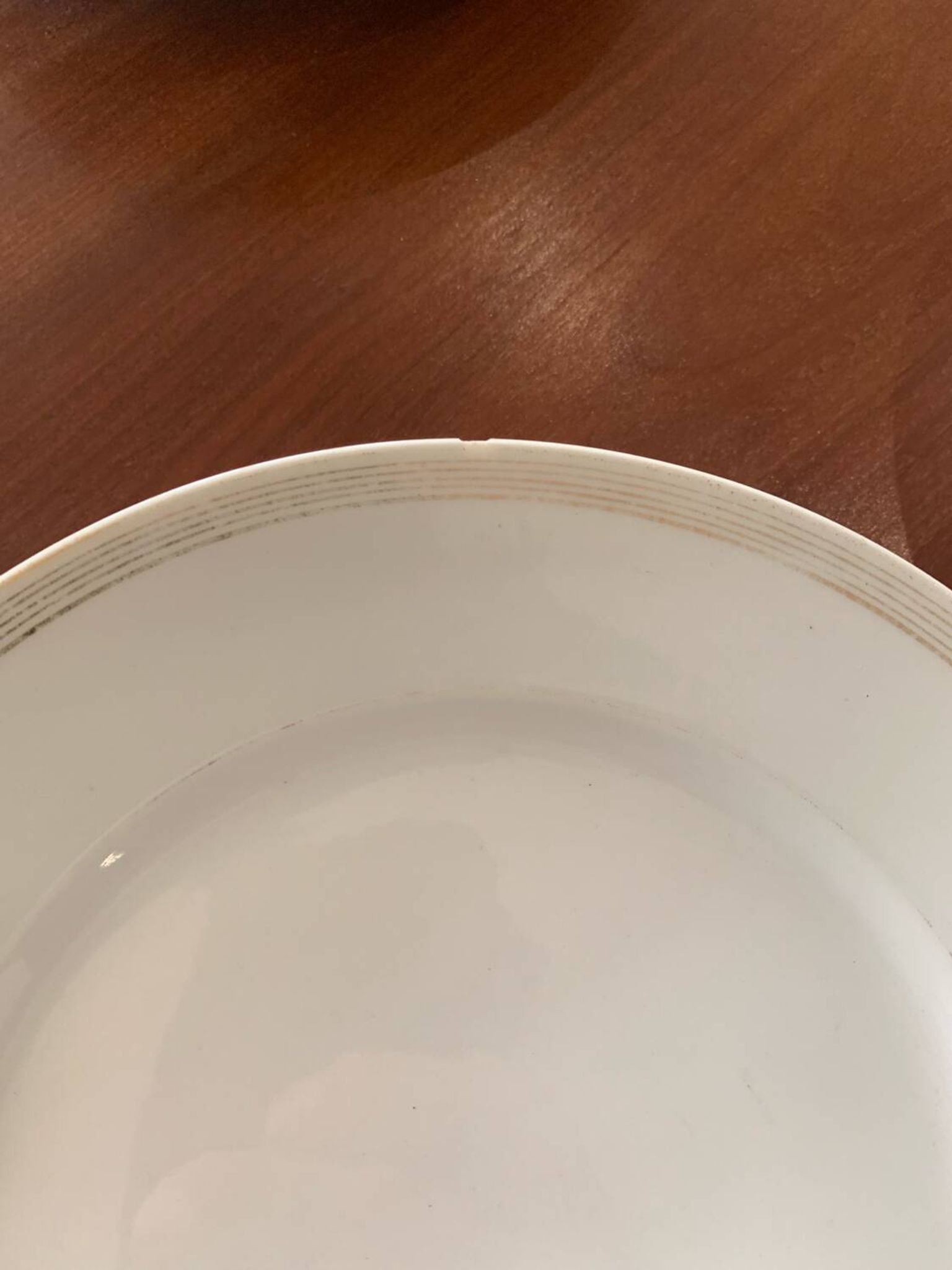 Lot of six flat plates, crockery, old white, gilded