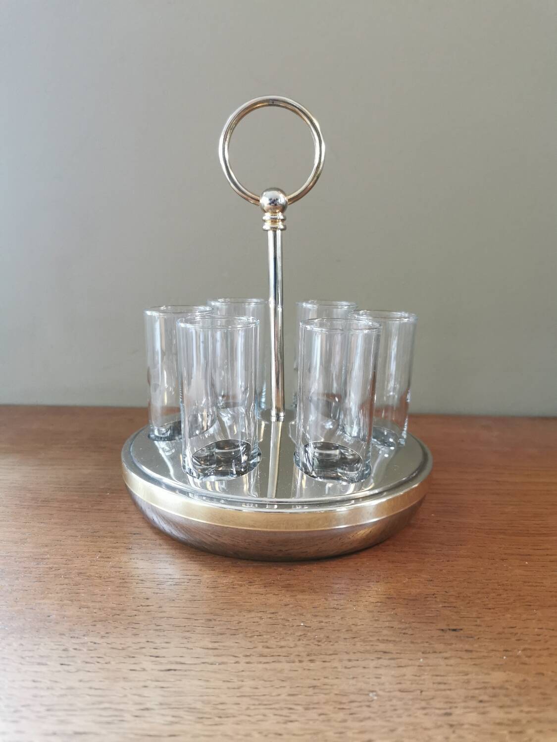 6 shot glasses on vintage metal support