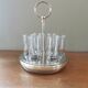 6 shot glasses on vintage metal support