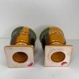 Pair of ocher and green ceramic point-a-line candlesticks