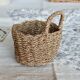 Small vintage woven fiber wall basket with handle