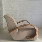 Art deco armchair in walnut and curly fabric
