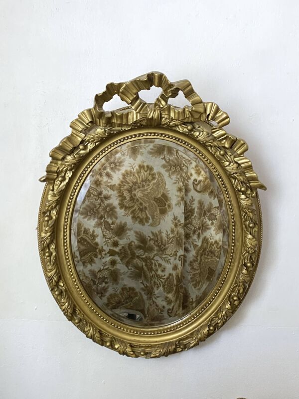 Miroir ancien ovale doré – style Louis XVI avec nœud ruban