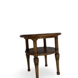Petite table basse en noyer sculpté années 1920