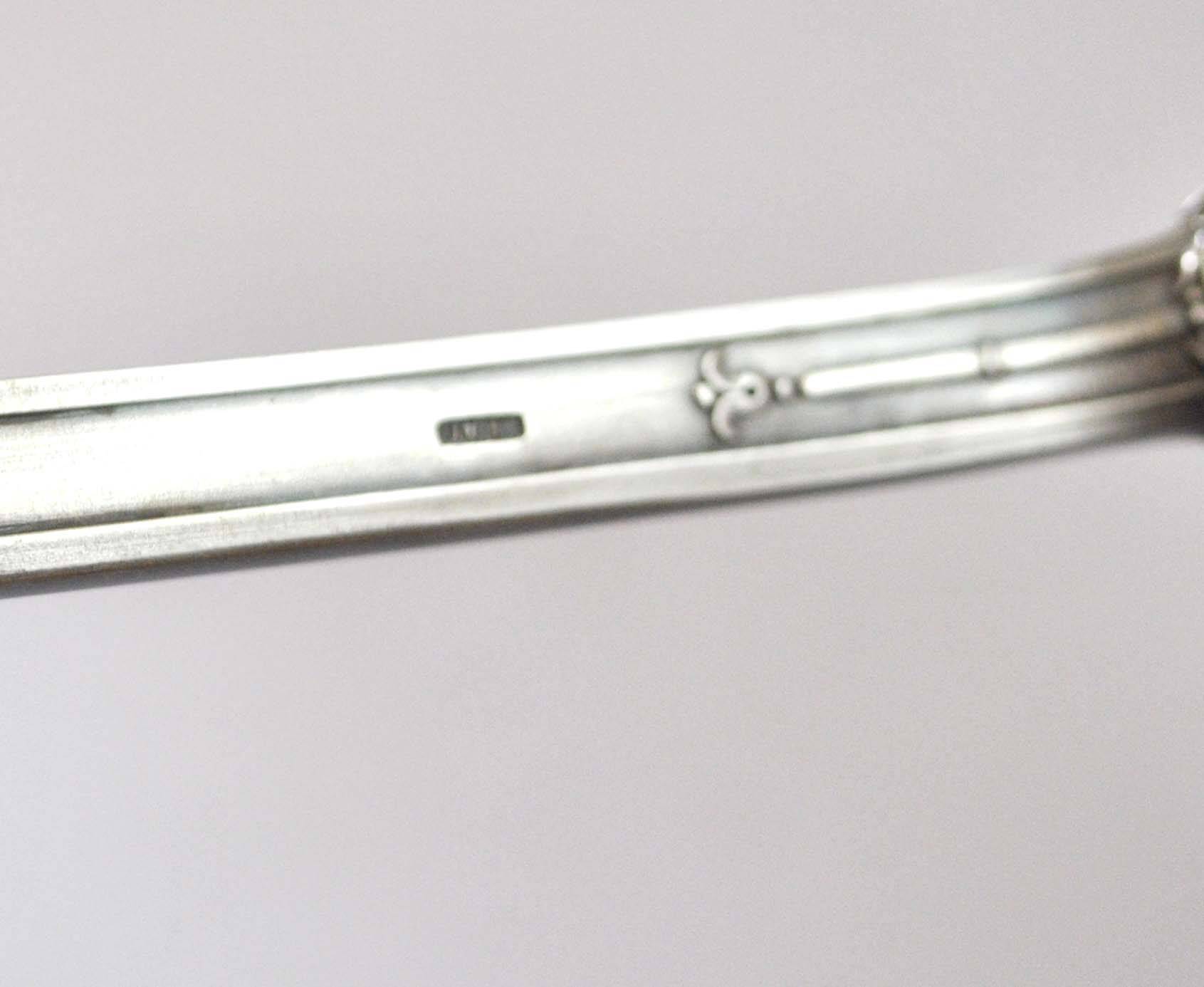 Empire ladle in silver metal SFAM - "Sans embarrass" model with winged shell laurel crown