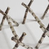 Set of six knife holders in silver metal in imitation of bamboo