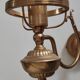 Antique brass wall sconce with two arms, Louis XV style.