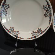 4 assiettes plates en terre de fer modèle OKAN de Longchamp