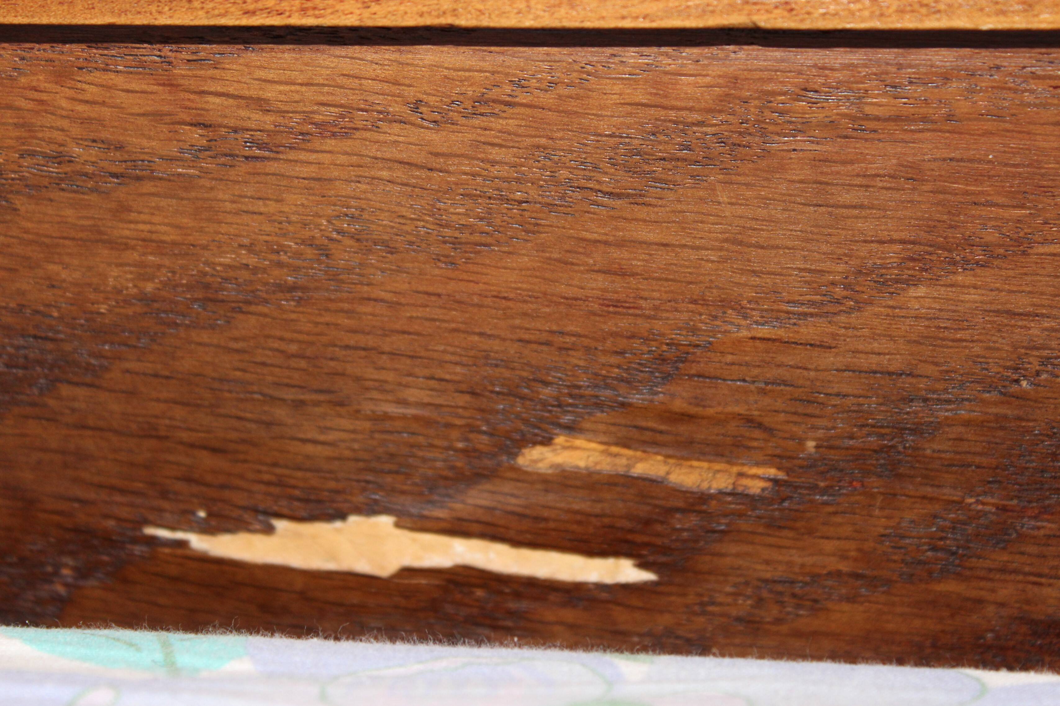 Walnut rocaille bed from the early 20th century.