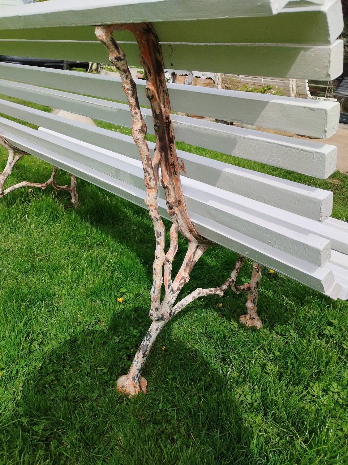 Banc de jardin avec pieds en fonte ancien
