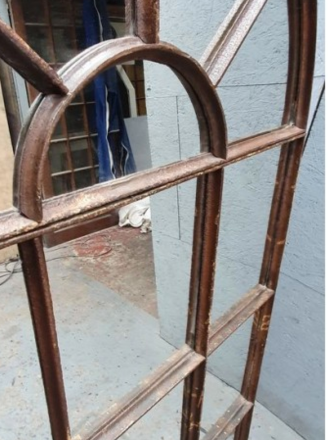 Metal industrial mirror in the shape of a warhead height 156 cm