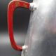 Ancienne cafetière en aluminium - anse rouge - vers 1930