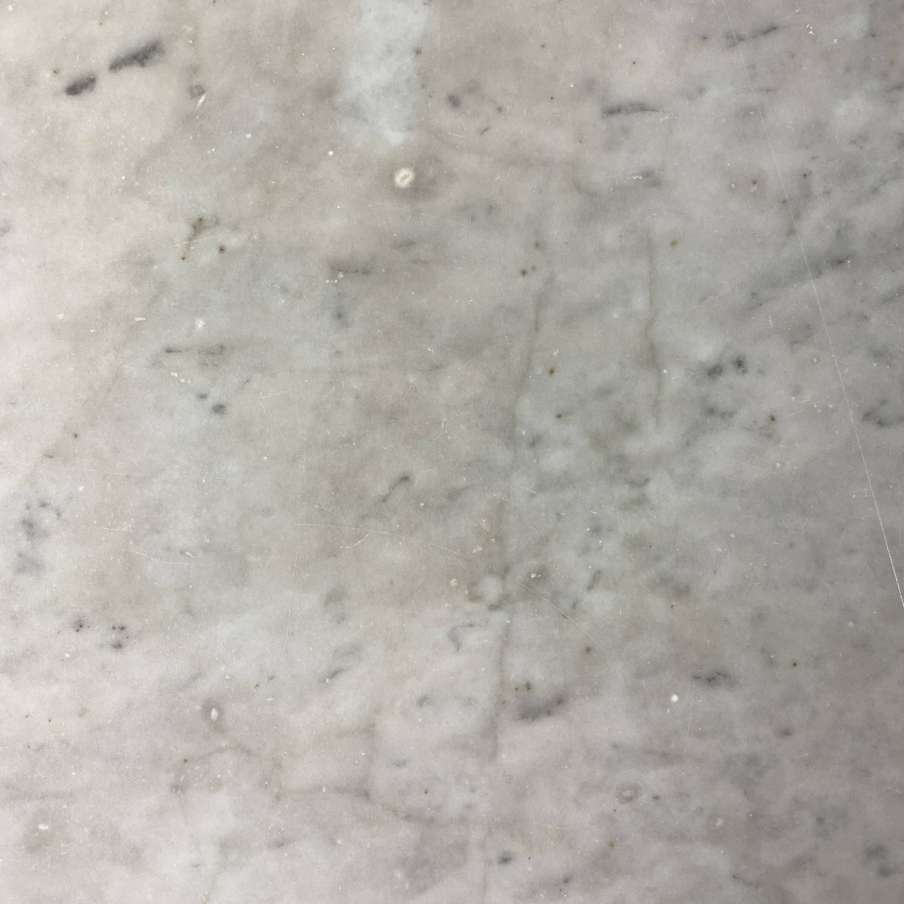 Set of two bistro tables in marble and wrought iron