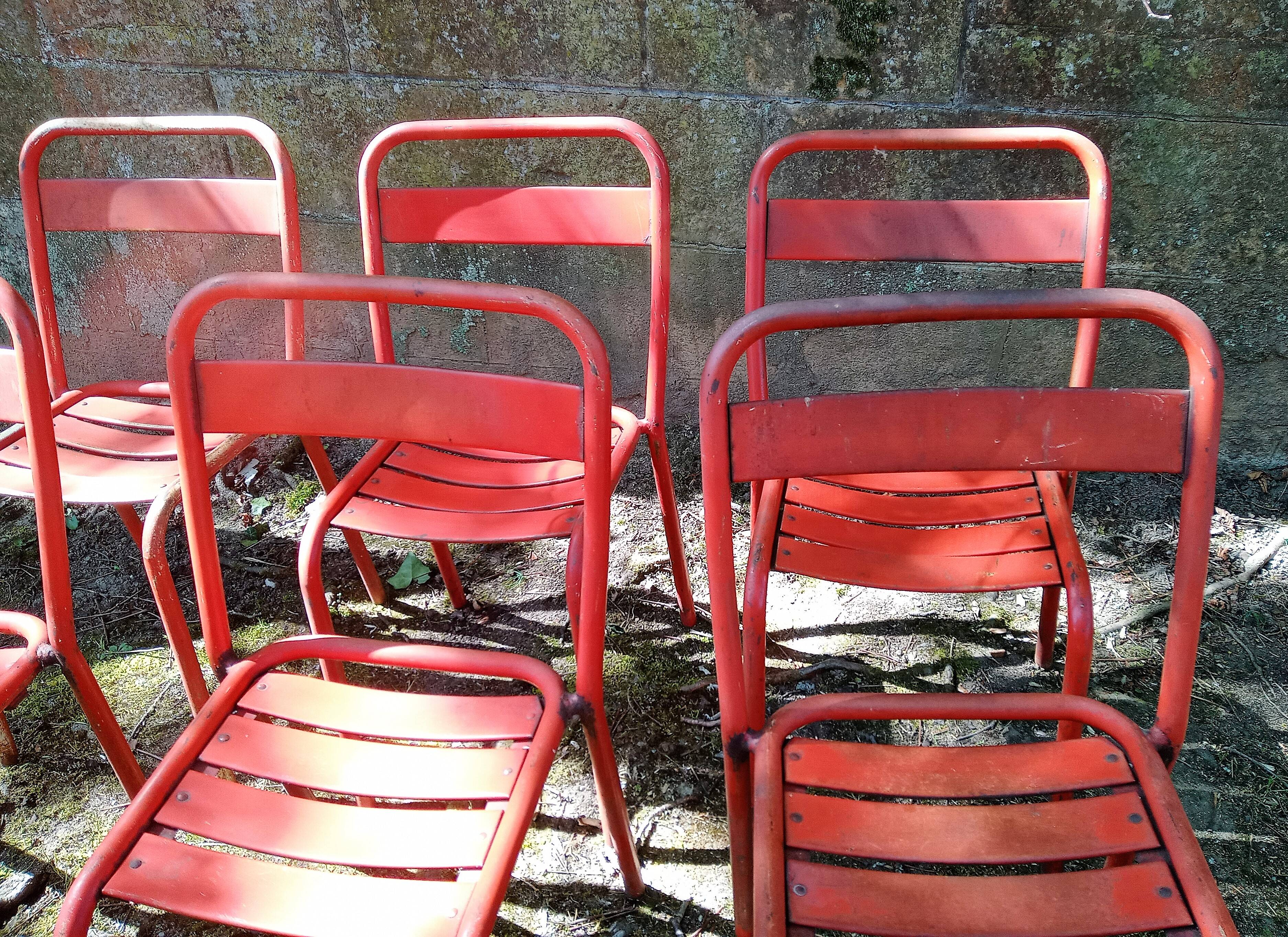 Series of 8 red Tolix chairs
