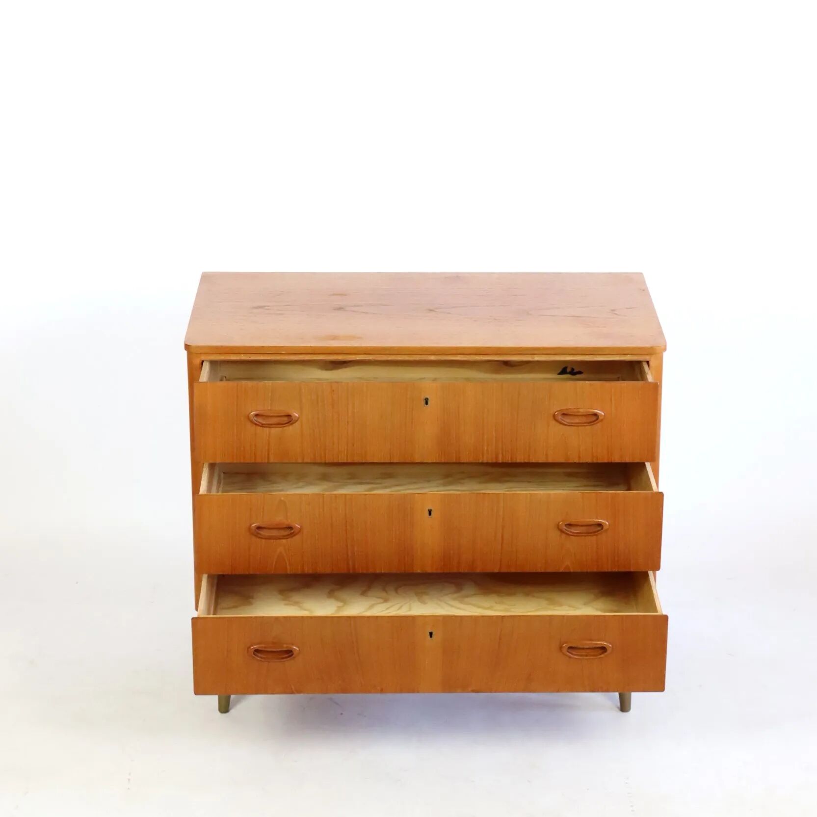Commode en teck trois tiroirs