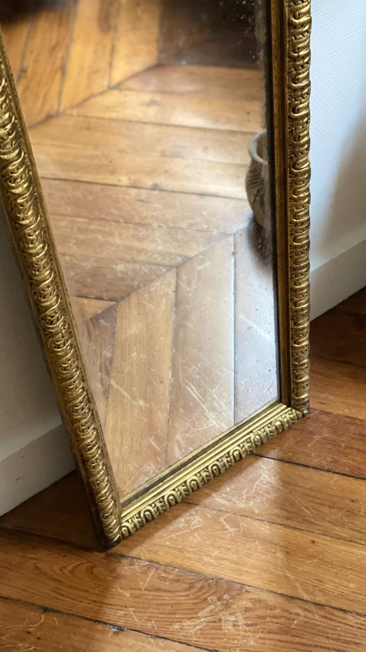 Old rectangular mirror between two golden Louis Philippe