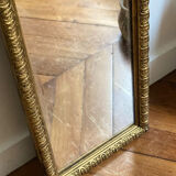 Old rectangular mirror between two golden Louis Philippe