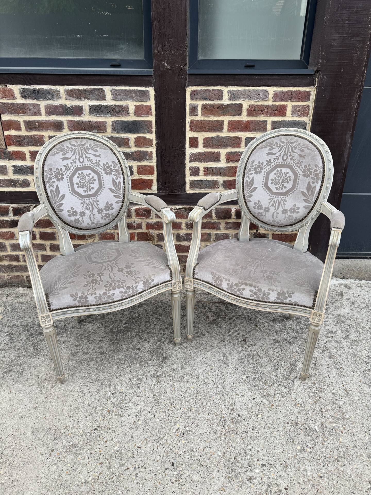 Pair of cabriole medallion armchairs in Louis XVI style