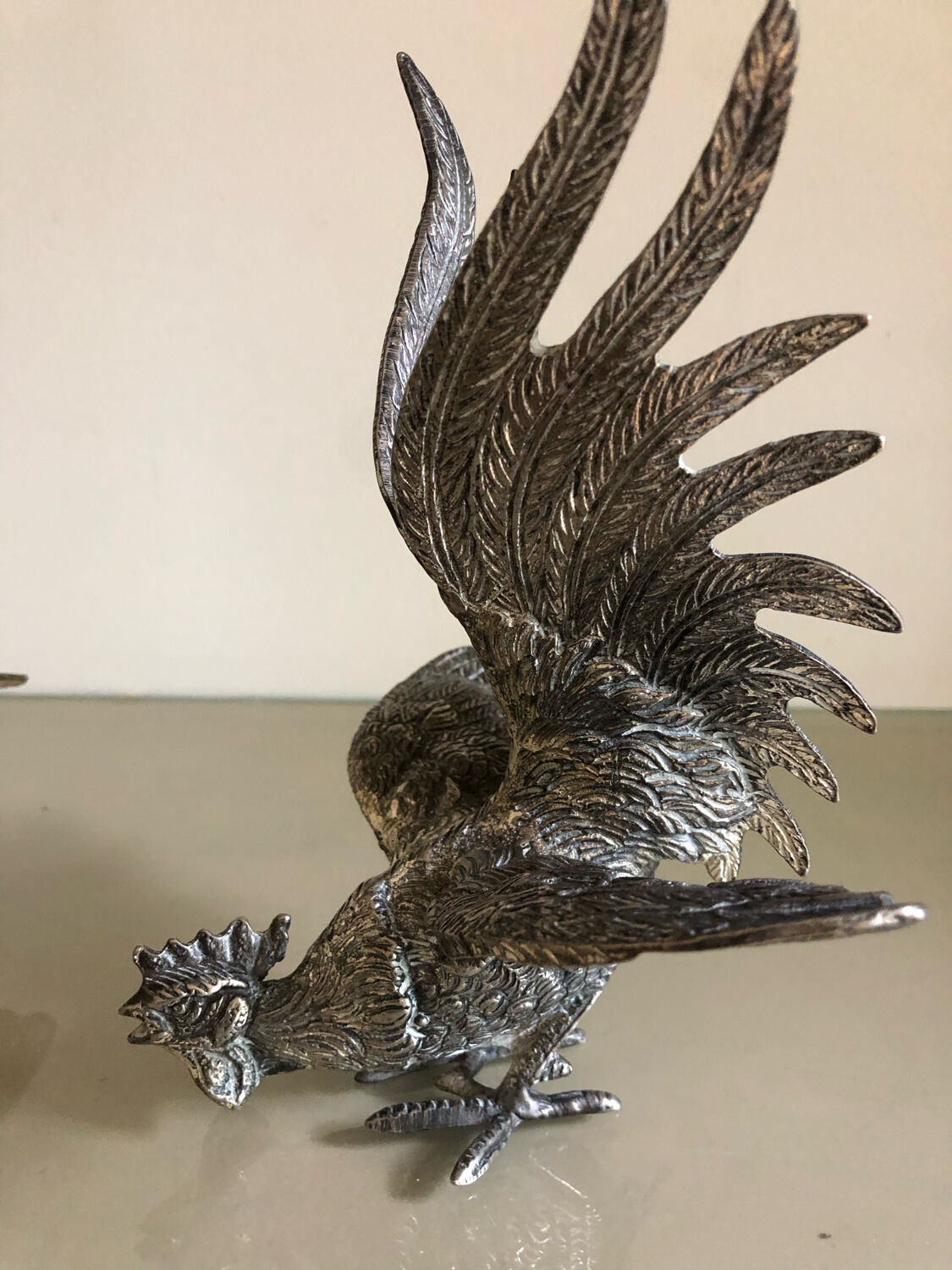 Vintage silver metal roosters