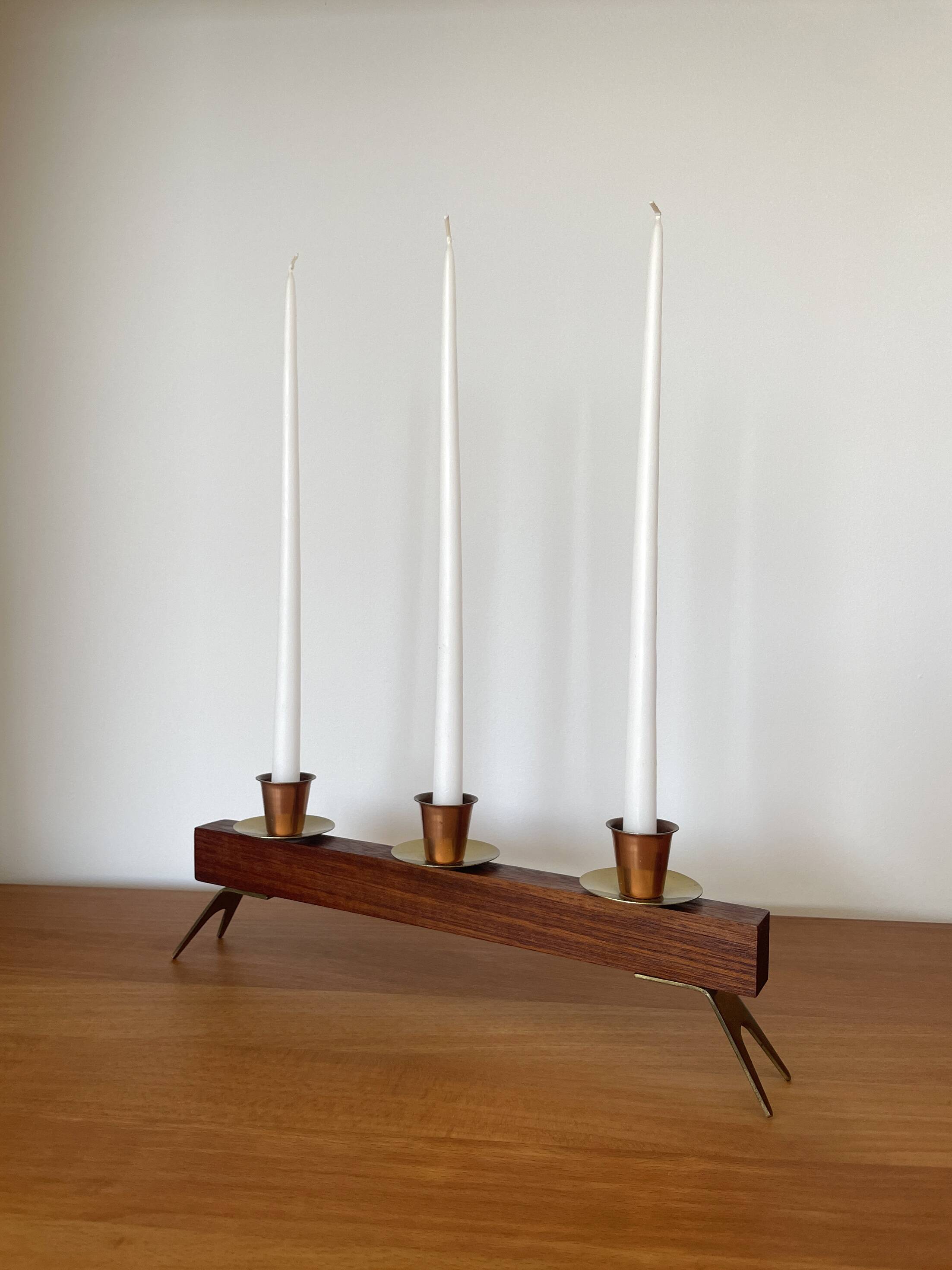Modernist chandelier in teak and vintage brass.