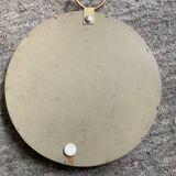 Vintage witch's eye mirror in gilded wood