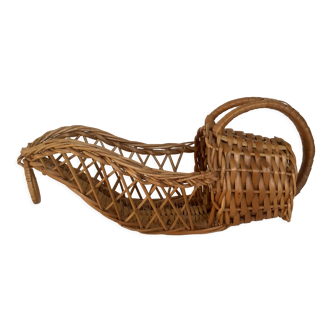 Old rattan wicker bottle holder