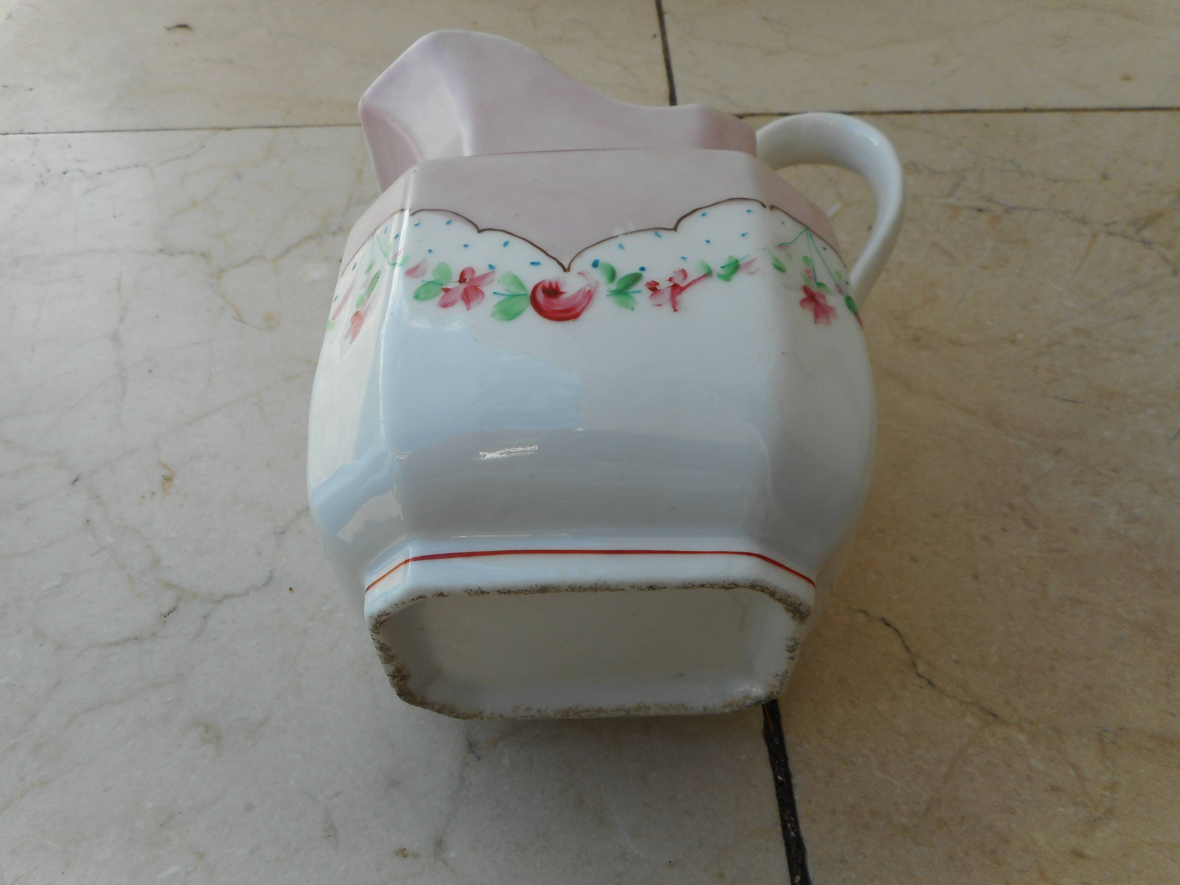 Ancient porcelain pitcher