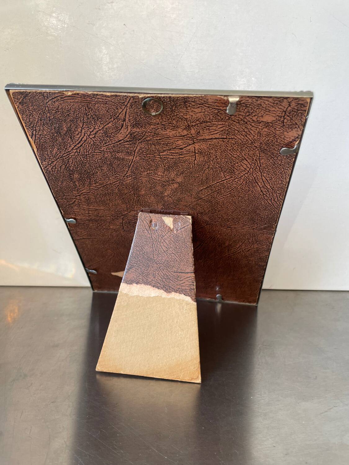 Art deco silver colored  metal frame  24.5  cm x 18.5 cm convex glass