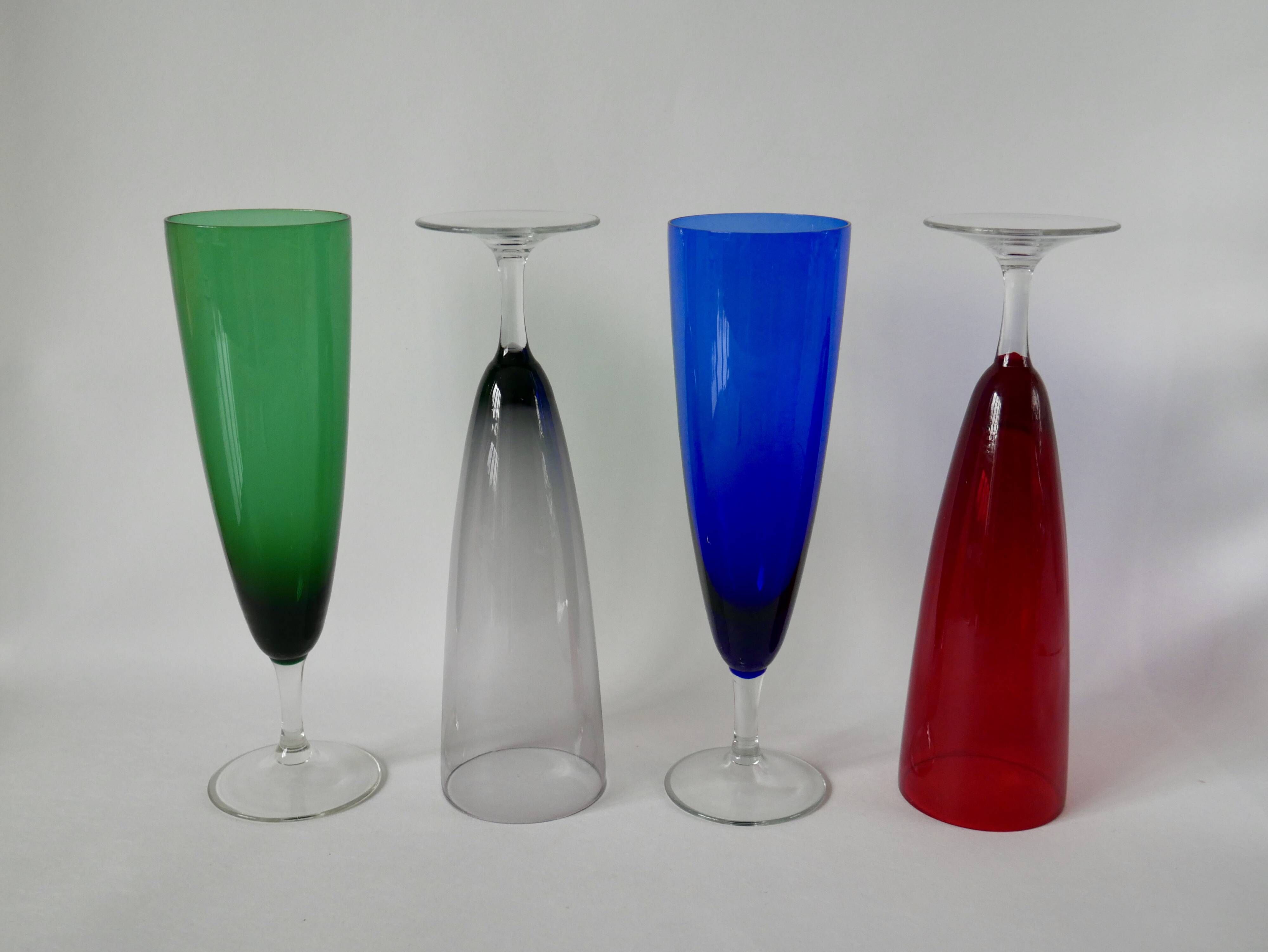 Set of 4 designer champagne flutes in colored glass from the 70s