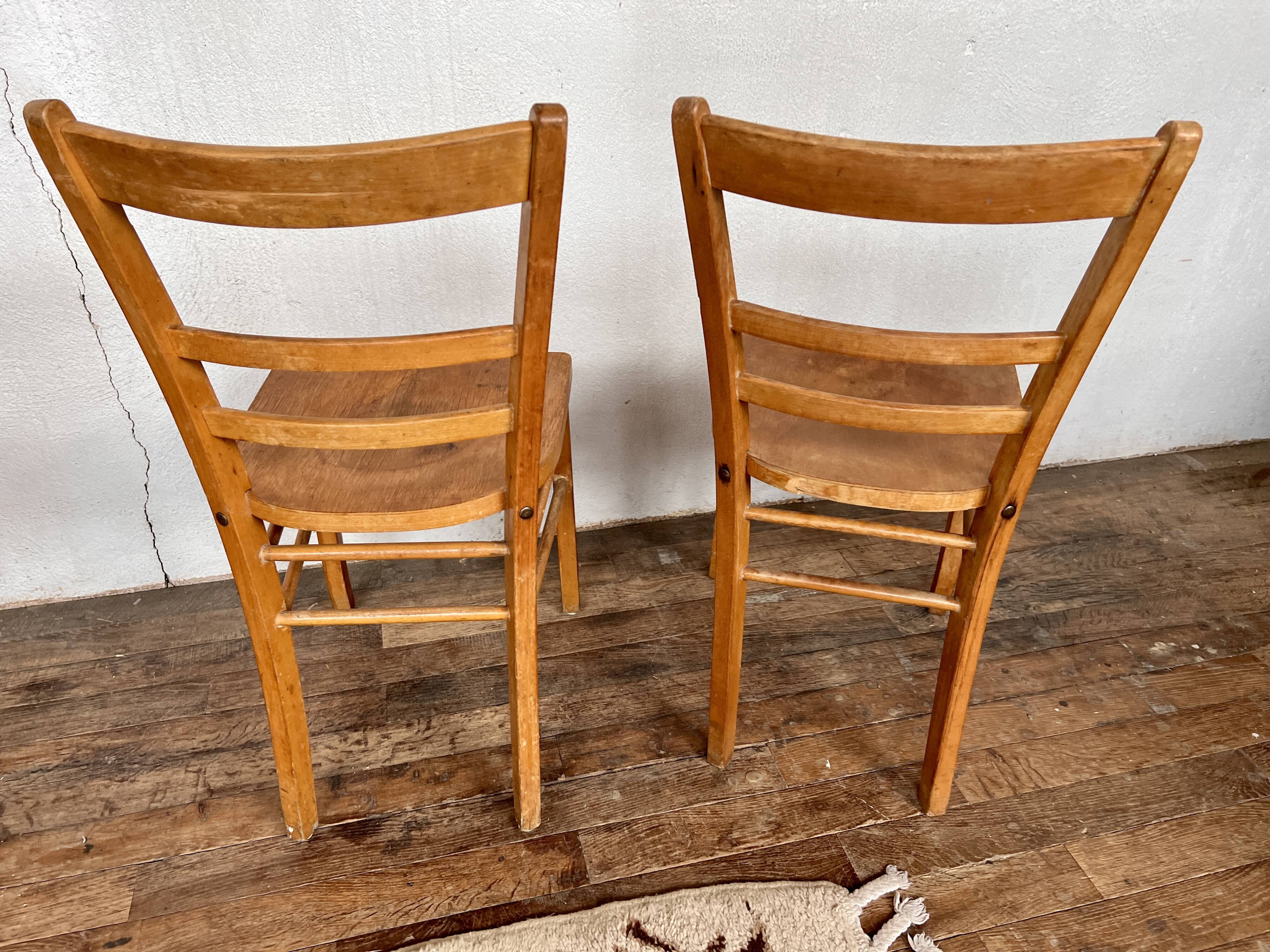 Series of 4 vintage light wood bistro chairs