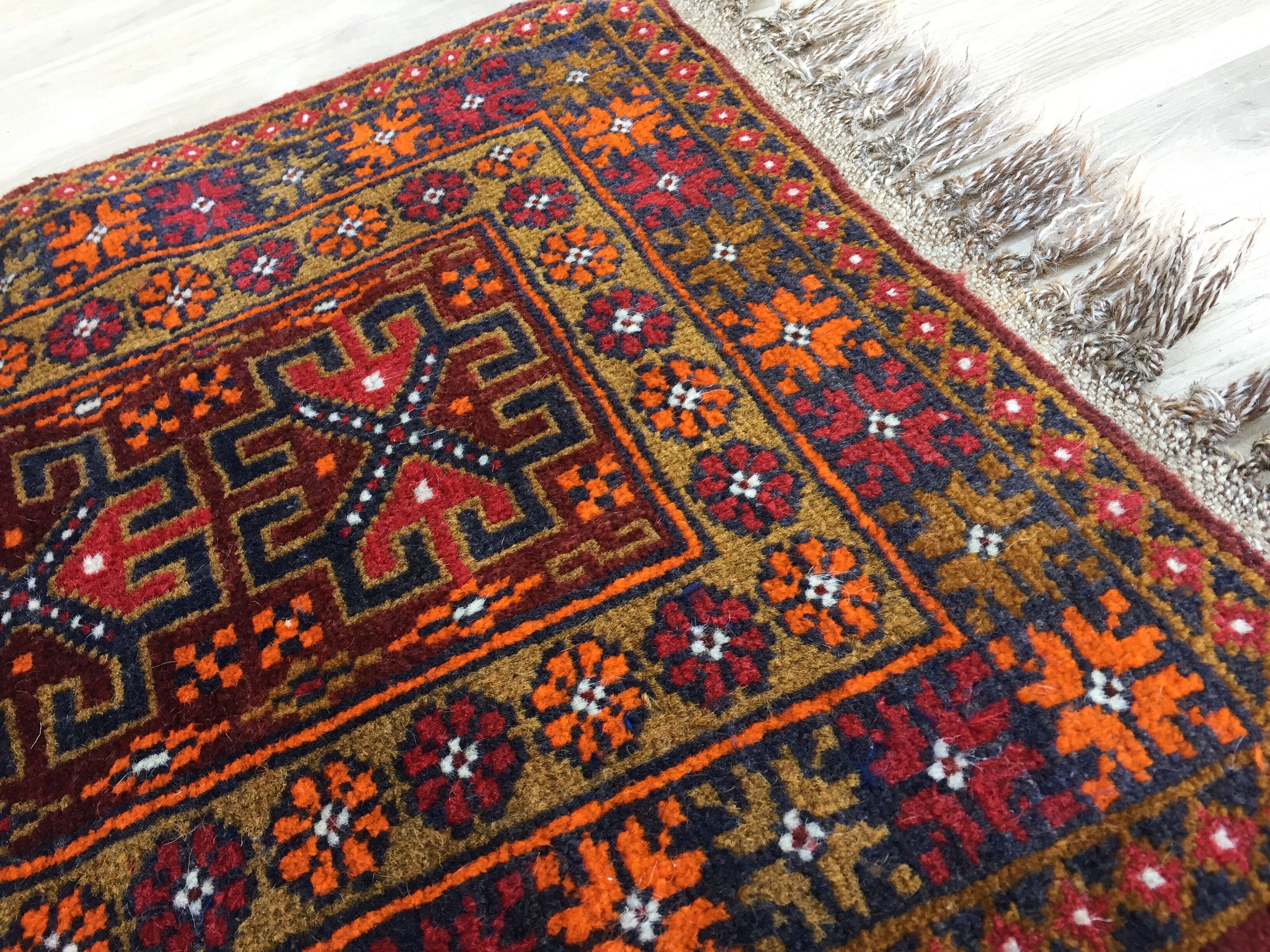Small oriental wool rug - 80 x 46cm