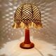 Bohemian table lamp in turned wood and macramé from the 1970s.