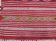 Tapis rouge artisanal en laine 115cm x 65cm