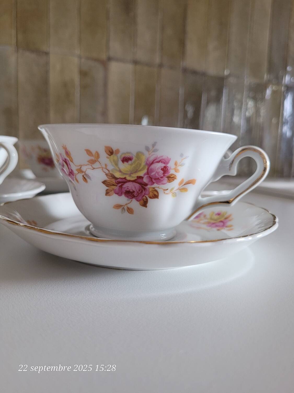 4 antique cups and saucers